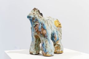 an artwork made of ceramics depicting a pony