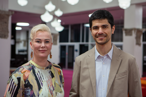 Picture of Marika Tervahartiala and Kamyar Hasanzadeh after the event in front of the Hybrid Stage area.