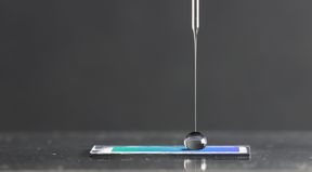 Friction measurement of a water droplet on a superhydrophobic surface