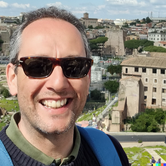 Mies aurinkolasit päässään hymyilee kameralle selfie-kuvassa, taustalla näkymä Roomassa