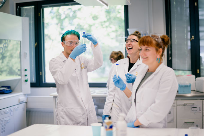 Three people in the laboratory