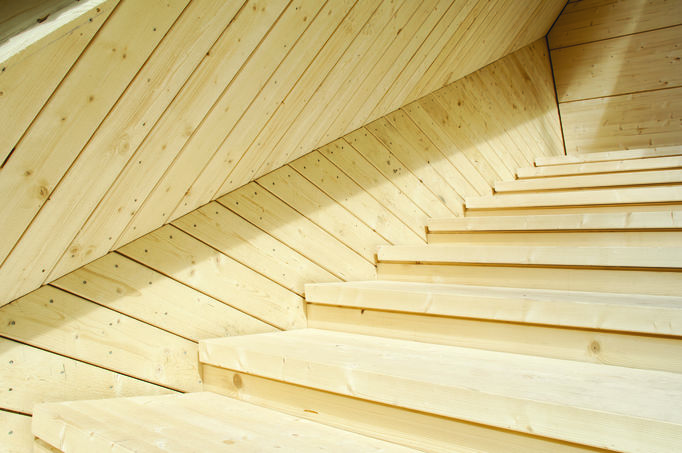 The terrace stairs of the Koe smoke sauna invite to experience the traditional smoke sauna in a new way. The experimental character of Alvar Aalto’s buildings at the site has been an inspiration for the project. Photo: Anne Kinnunen