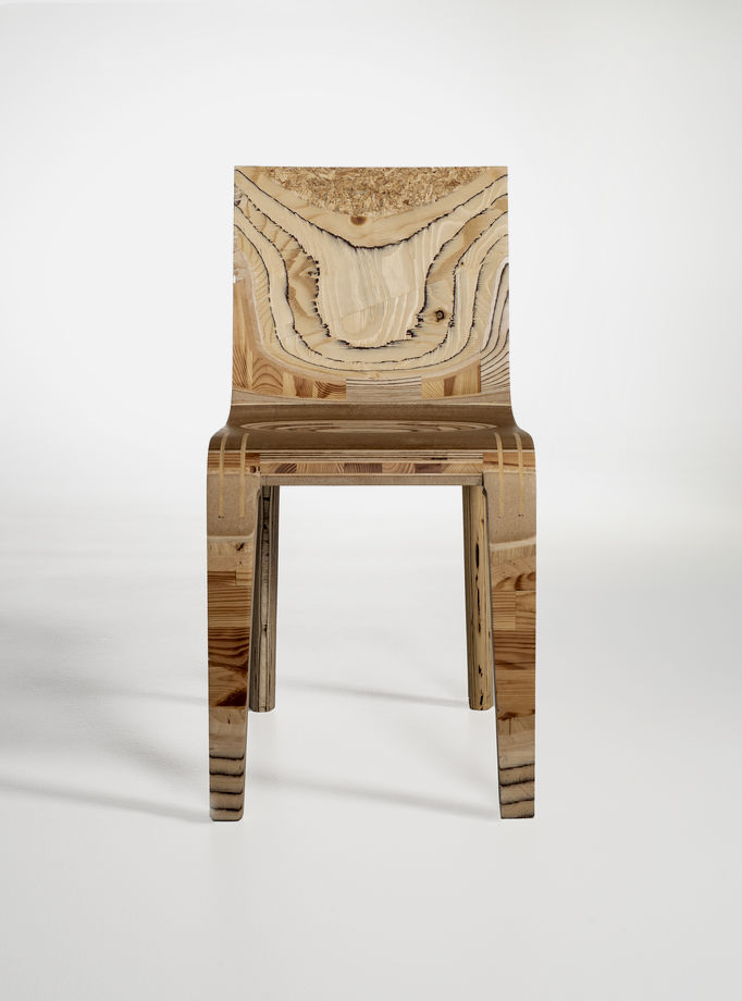 a chair made out of recycled wood materials
