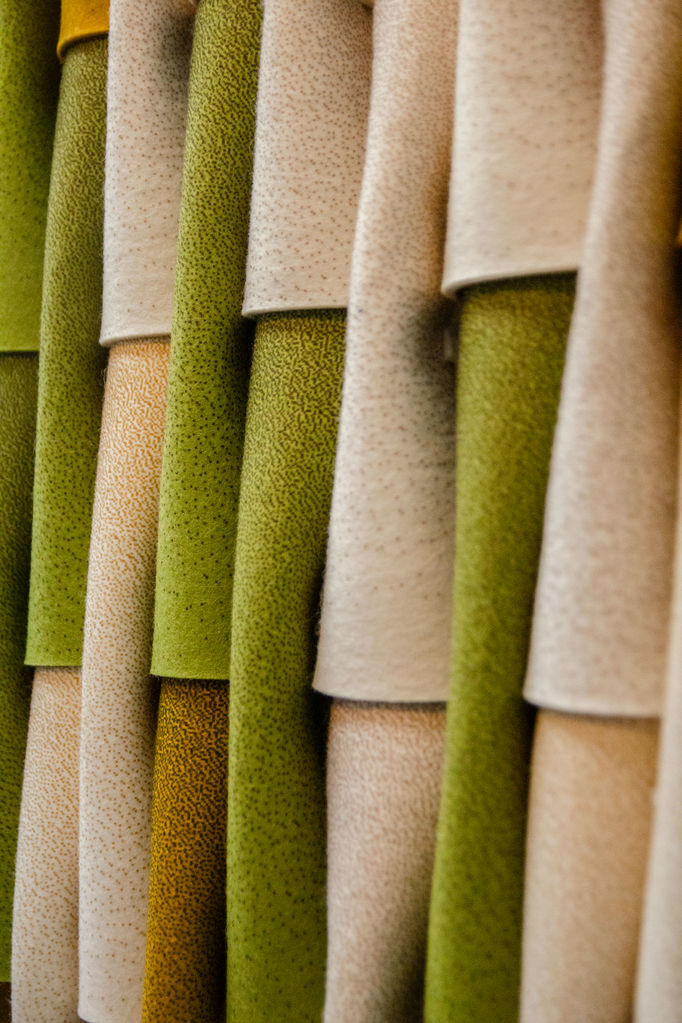 Soft textile surface with varying colours on display in an exhibition