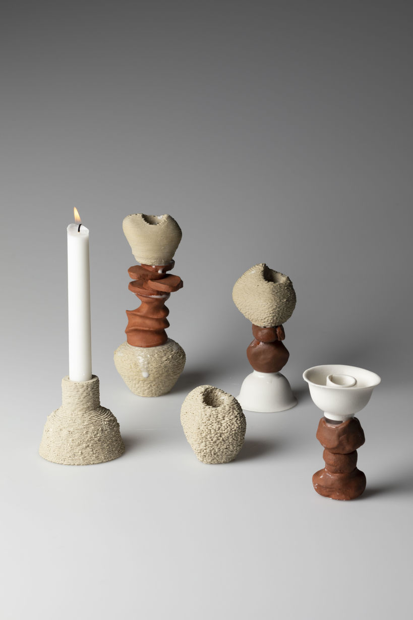 five ceramic sculptures / candle holders 