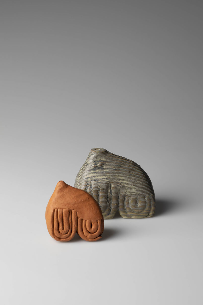 two ceramic sculptures referencing to venus