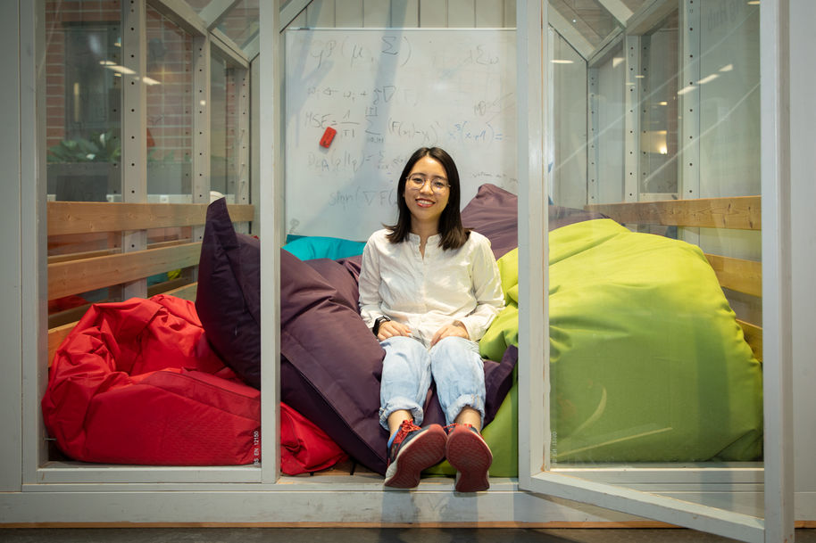 Linh Nguyen sitting in a room full of Fatboy beanbags