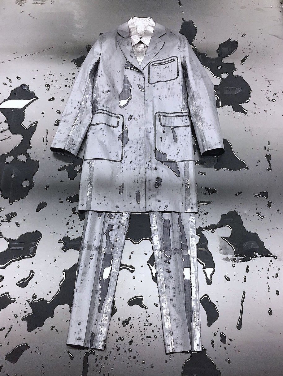 A grey waterproof suit