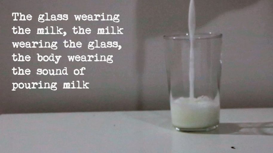 milk being poured in a glass with text on a side