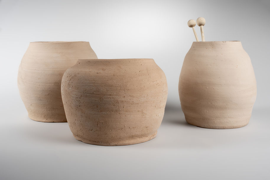 close-up of three ceramic pots