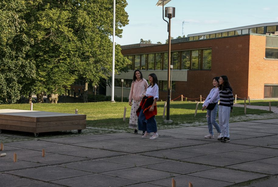 Christina and her summer school friends playing the Finnish "Mölkky" game.