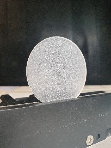 picture of round sample in a holder