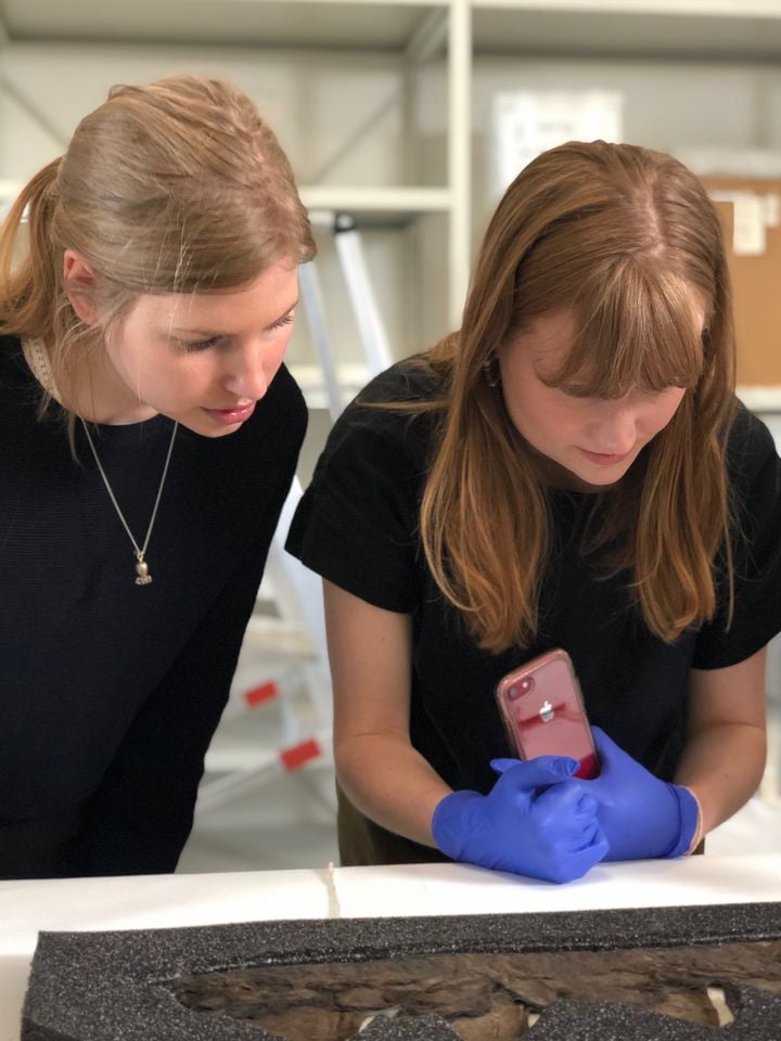 Examining 17th century hat fragment at the Museum of Copenhagen. Photo: Refashioning the Renaissance project, 2019.