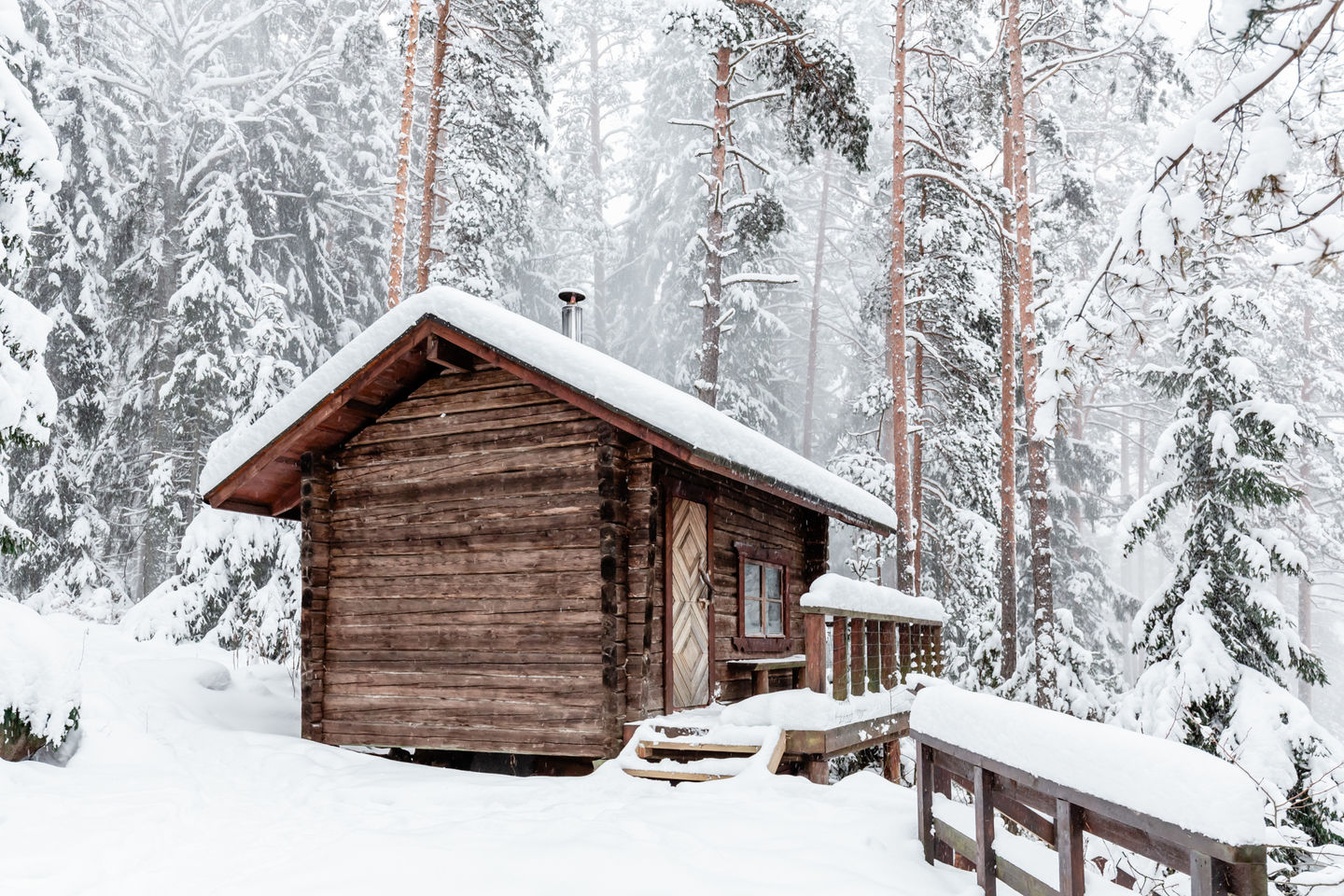 Cottage in snowy forest in Finland. Photo: Natura Viva / Helsinki Marketing.jpg