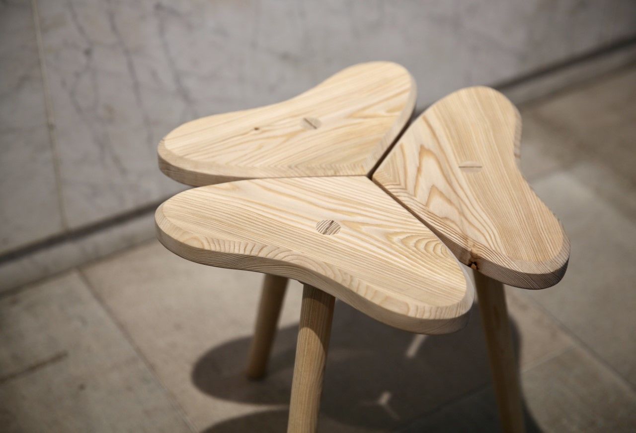 wooden stool in shape of clover
