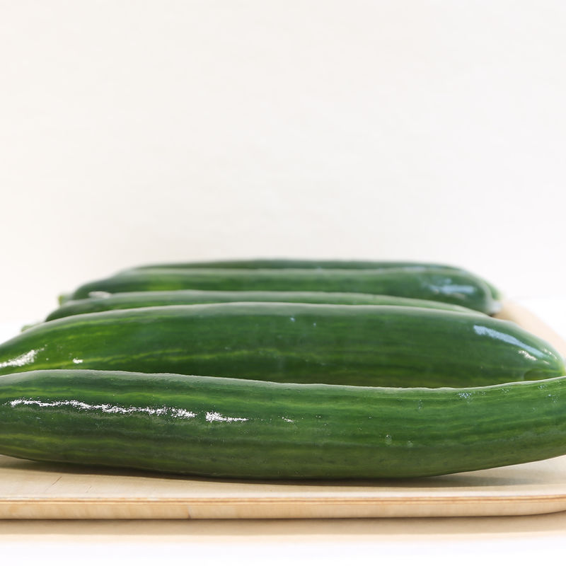 cucumbers on a plate covered with biobased liquid